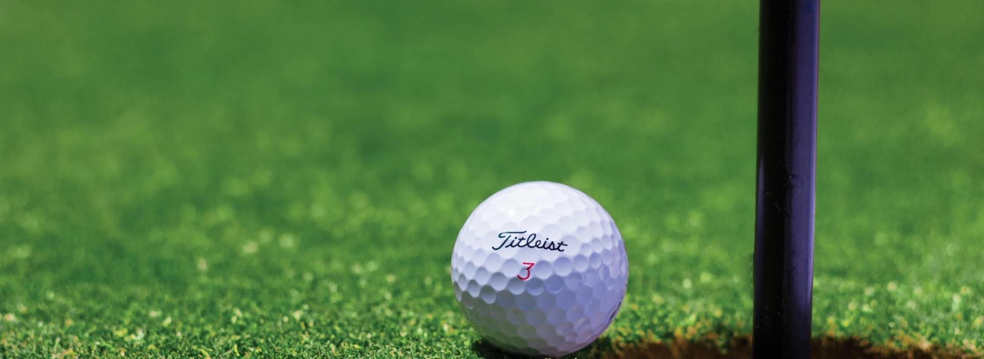 Golf ball near hole