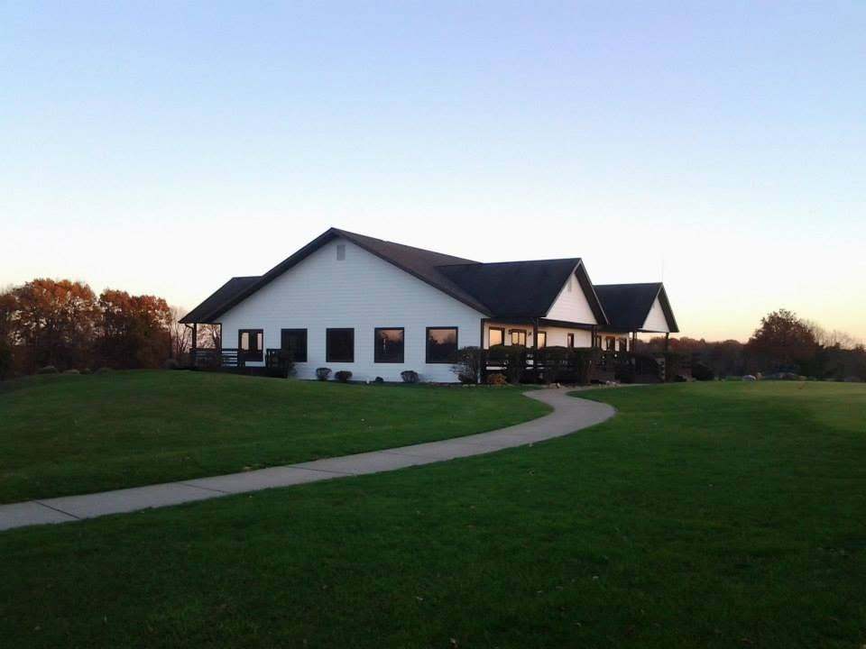 Clubhouse with path leading to entrance